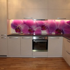 Photo glass with purple orchids